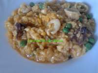   ARROZ CON CALAMARCITOS Y GAMBITAS