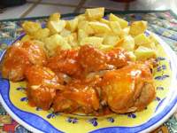   Pollo guisado con tomate