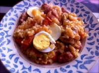   Arroz con pollo y salchichas