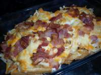   PATATAS FOSTER CON BACON Y QUESO