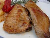  Secreto y costilletas de cerdo ibérico con salsa de limón