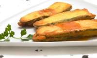   Receta de San Jacobos de calabacín, jamón y queso con salsa marinera.Según el gran cocinero Karlos Arguiñano.