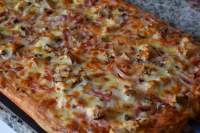   Pizza con solomillos de pollo picantes