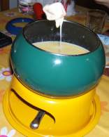   Fondue de quesos suizos y uso del aparato para hacer fondue