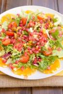   Ensalada con fruta de invierno y reducción de naranja