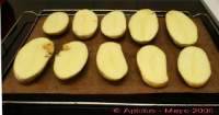 
Patatas asadas y luego rellenas con chorizo y jamón  
