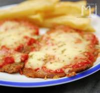 
MILANESA A LA NAPOLITANA (EL PLATO FAVORITO DE LEO MESSI)  