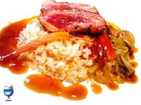   Arroz ku-bak (o arroz inflado) con pato