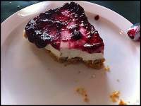   Tarta de queso con arándanos.