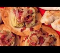   Pizzetas de alcachofa, cebolla caramelizada y jamón