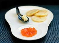   Caviar con blinis