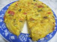   Tortilla de patatas con pisto