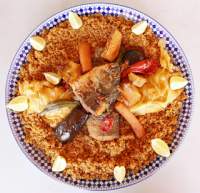 Pescado con arroz y verduras al estilo senegalés  