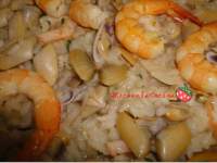   Arroz con coquinas y gambas