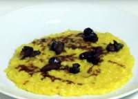 Risotto azafranado con caracoles glaseados