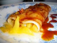   Frixuelos con mango caramelizado