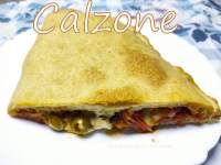   Calzone de champis, queso, cherrys y aceitunas