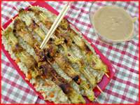   D.C. Cerdo satay y un risotto con aromas orientales.